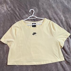 Neon green oversized Nike crop top